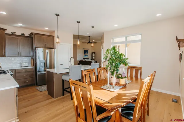 a view of a dining room with furniture