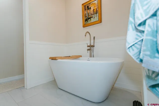 a view of a bathtub in a bathroom