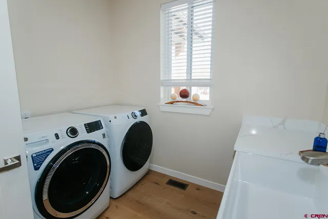 a utility room with dryer and washer
