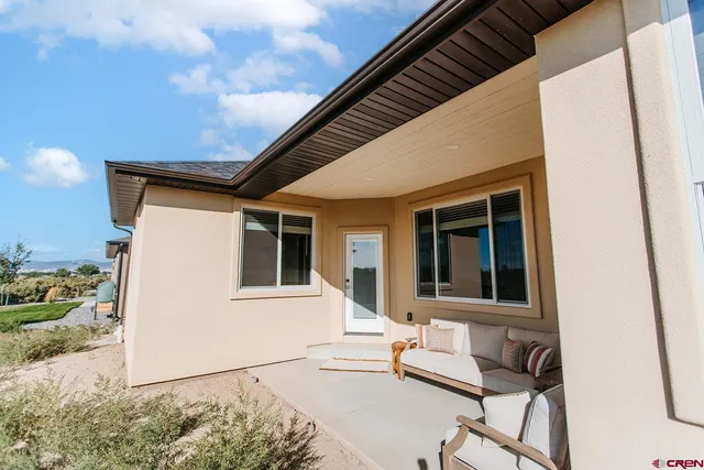 a house with trees in the background