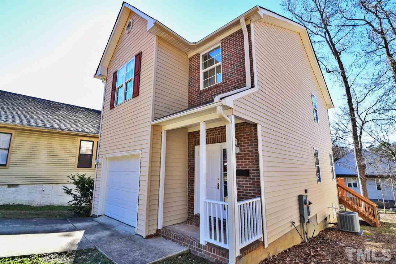 702 Method Road Raleigh, NC 27607 - Photo 2 of 25 a view of a house with a yard