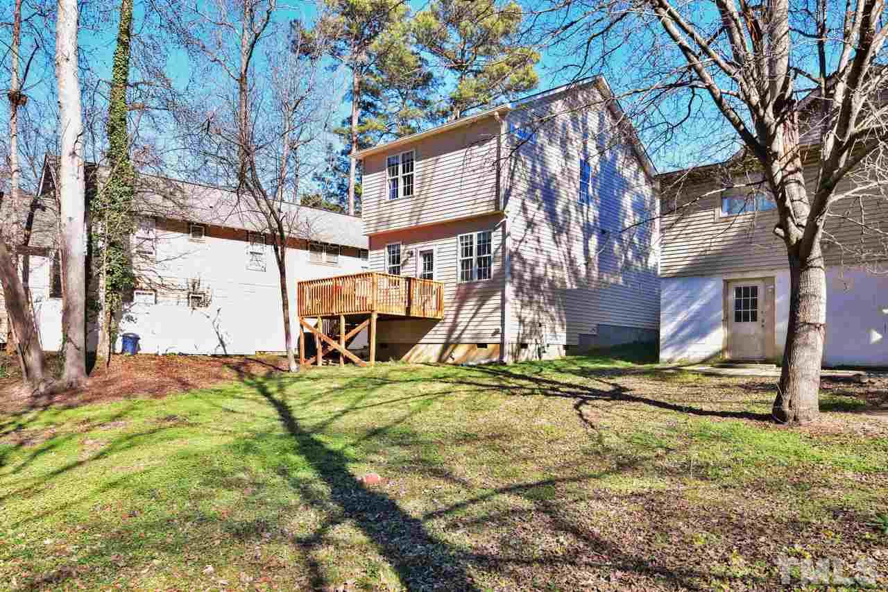 702 Method Road Raleigh, NC 27607 - Photo 24 of 25 a view of a house with snow on the tree