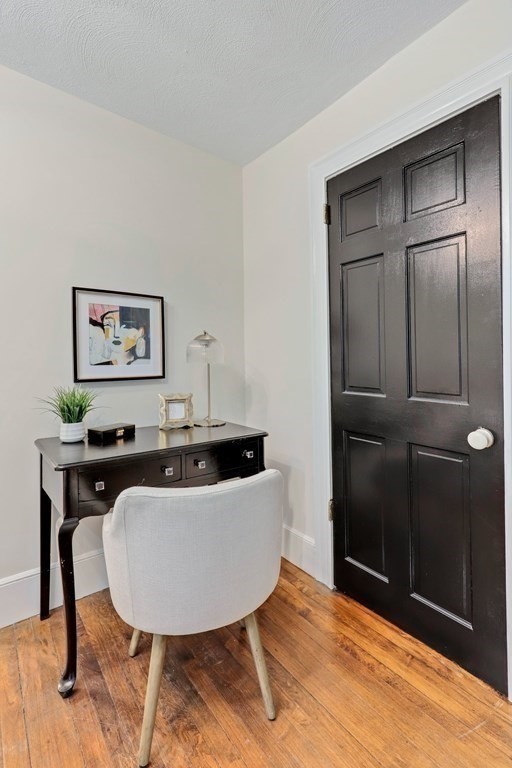 2 Goodwin Place, Unit 3 Boston, MA 02114 - Photo 20 of 28 a view of a kitchen with table and chair