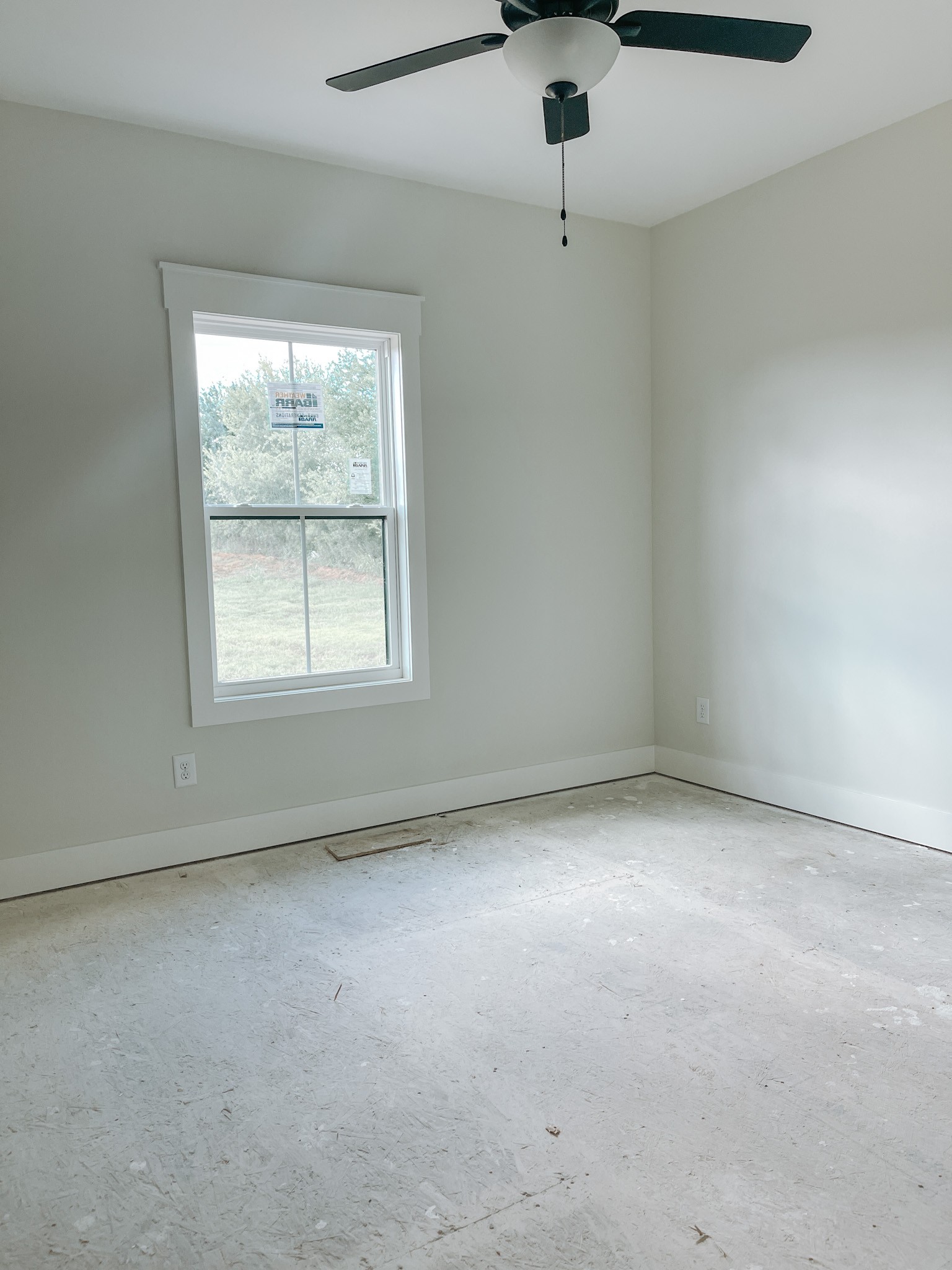 251 Tom Ferrell Road Portland, TN 37148 - Photo 6 of 7 an empty room with a window