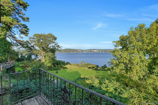 a view of a balcony with an outdoor space