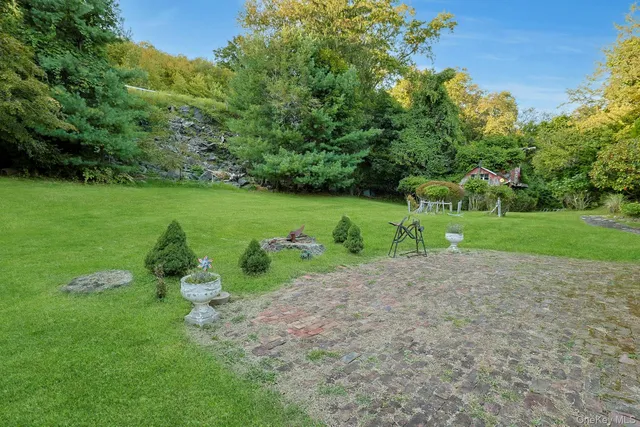 a view of a park with large trees
