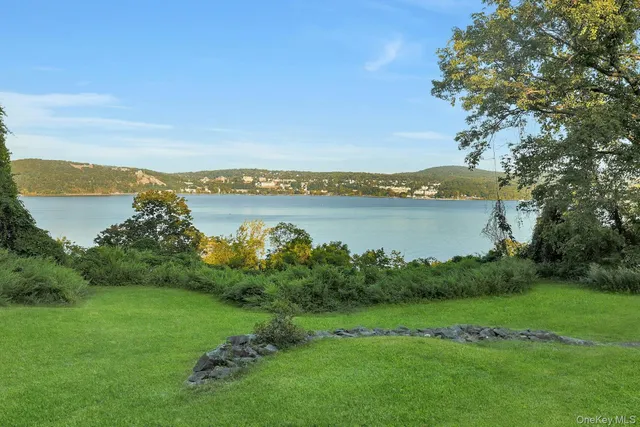 a view of a lake with a city