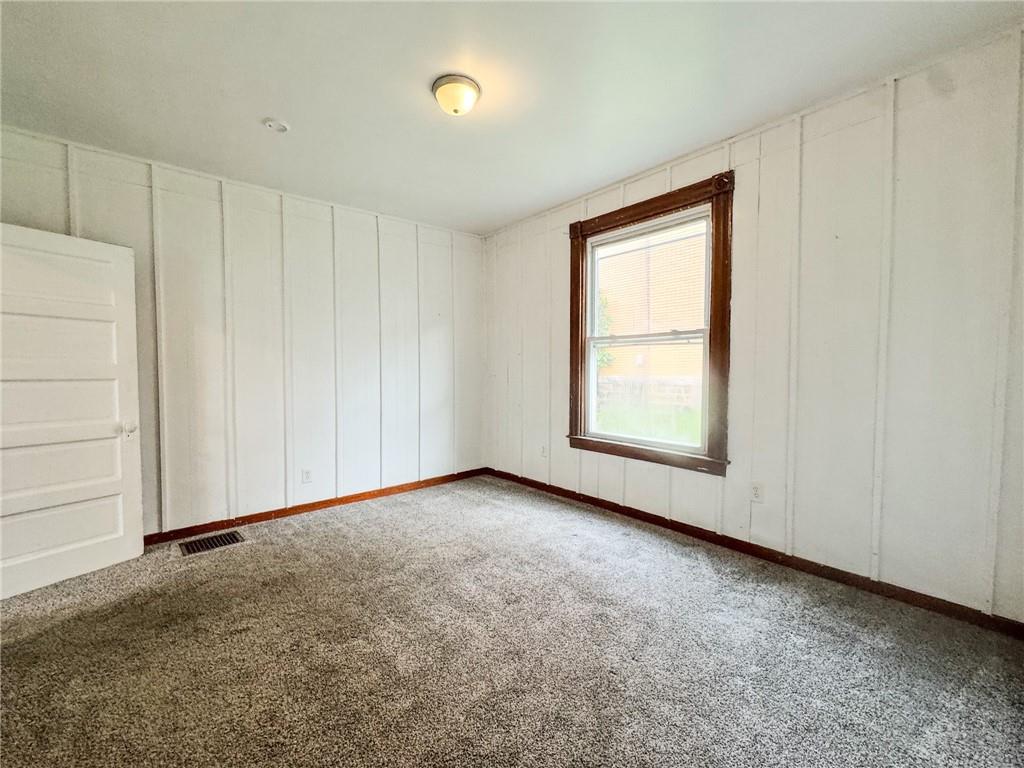 604 Center Avenue Butler, PA 16001 - Photo 13 of 17 a view of an empty room with a window