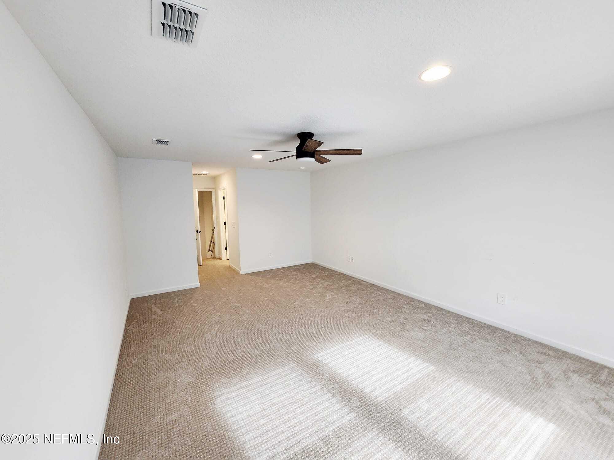 577 Archstone Way St. Augustine, FL 32092 - Photo 20 of 45 a view of a room with a ceiling fan