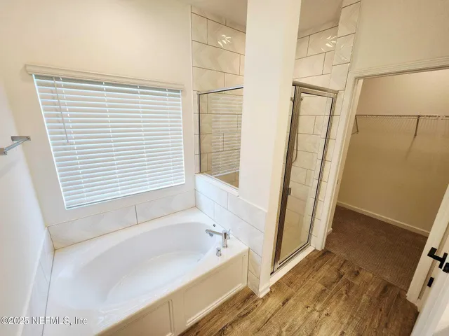 a view of empty room with windows