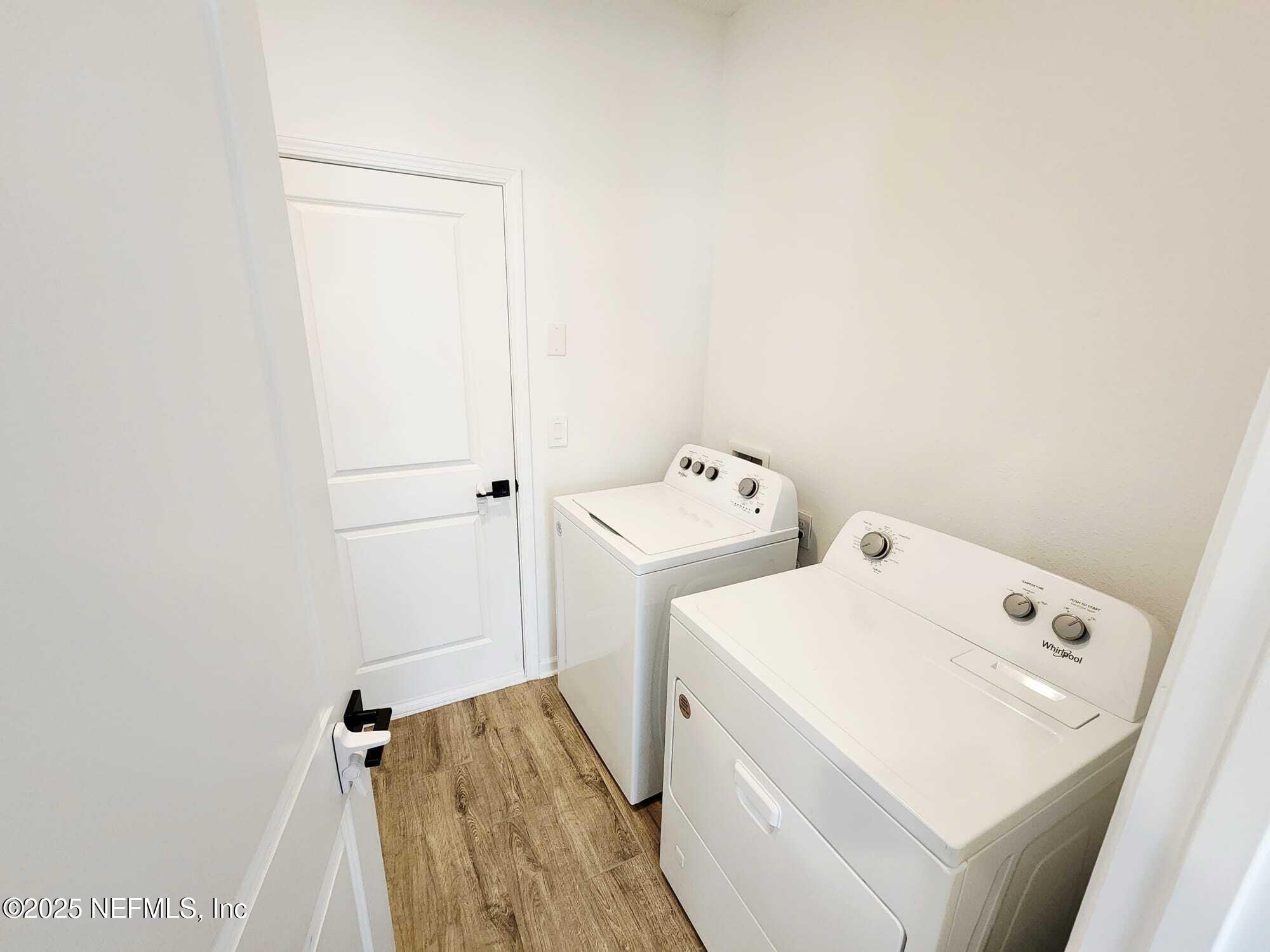 577 Archstone Way St. Augustine, FL 32092 - Photo 40 of 45 a utility room with dryer and washer