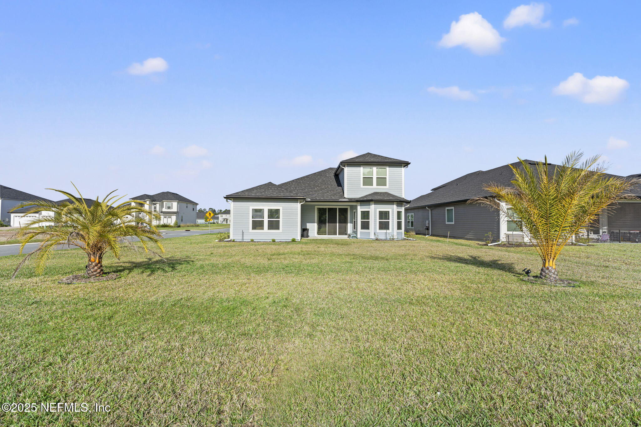 577 Archstone Way St. Augustine, FL 32092 - Photo 43 of 45 a front view of a house with a garden