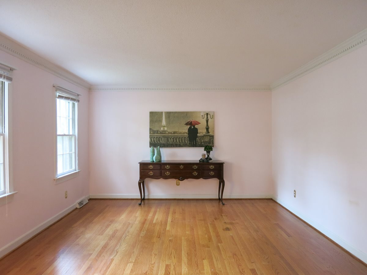 1120 Country Ridge Drive Raleigh, NC 27609 - Photo 4 of 25 Off the Foyer, the spacious Living Rm has hardwood floors & dentil crown molding. Living Room