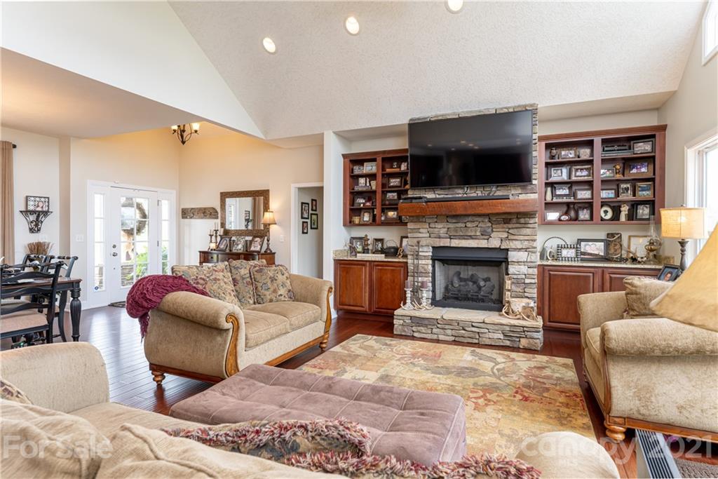 12 Horizon View Lane Alexander, NC 28701 - Photo 13 of 36 a living room with fireplace furniture and a flat screen tv