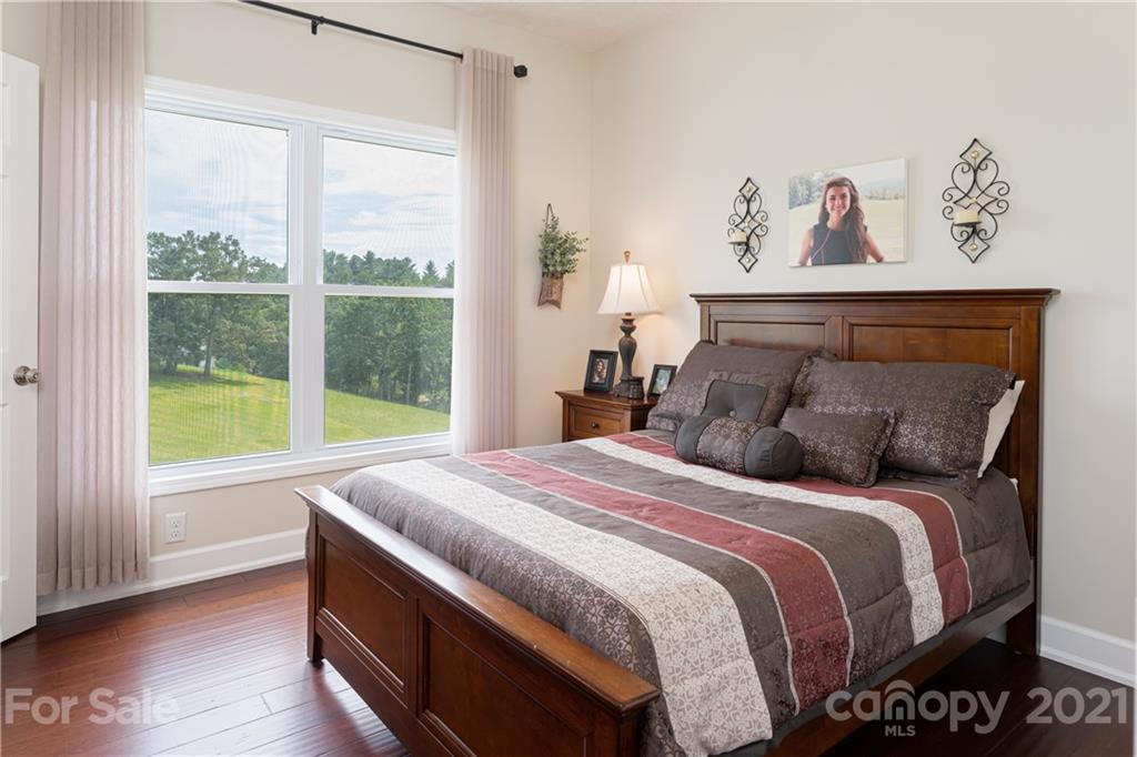 12 Horizon View Lane Alexander, NC 28701 - Photo 22 of 36 a bedroom with a bed and a window