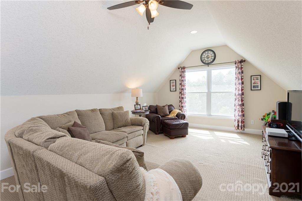12 Horizon View Lane Alexander, NC 28701 - Photo 24 of 36 a living room with furniture and a large window