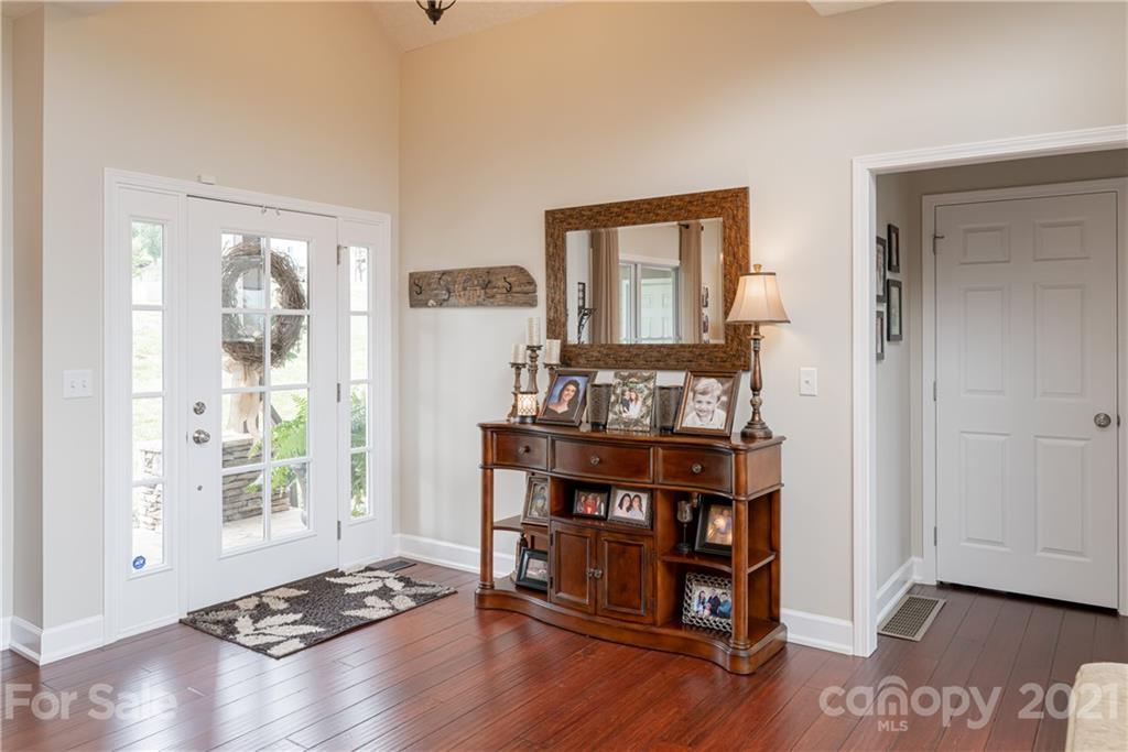 12 Horizon View Lane Alexander, NC 28701 - Photo 4 of 36 a view of workspace with wooden floor and windows