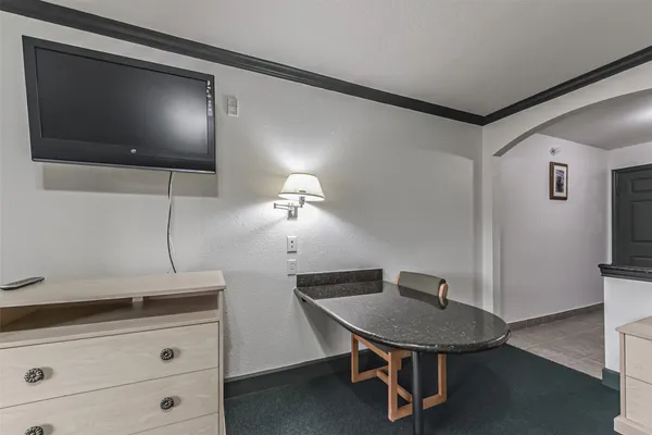 a kitchen with a sink stainless steel appliances and cabinets
