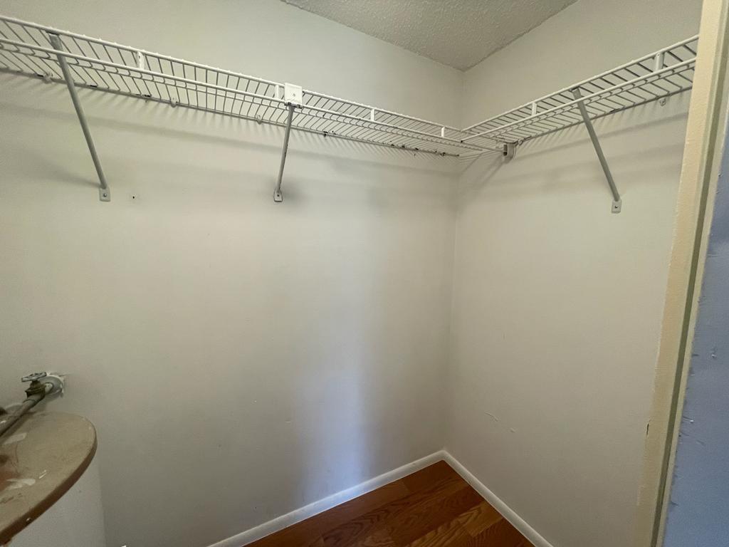 2621 Riverside Drive, Unit 6 Coral Springs, FL 33065 - Photo 14 of 20 a small space with wooden floor and windows