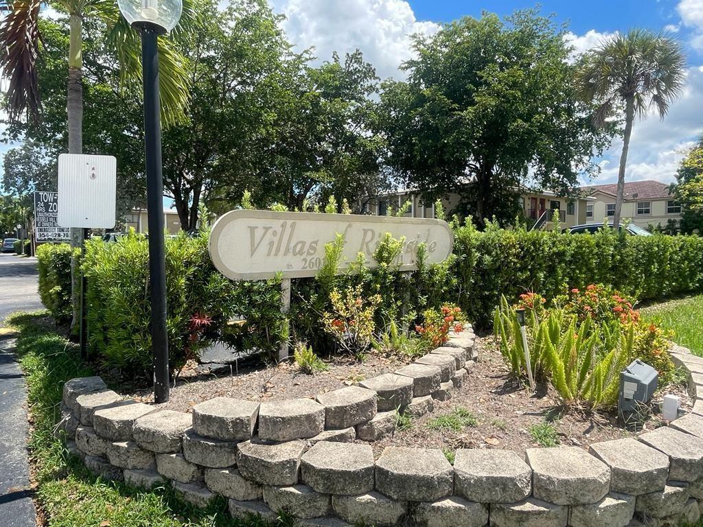 2621 Riverside Drive, Unit 6 Coral Springs, FL 33065 - Photo 16 of 20 a view of a backyard