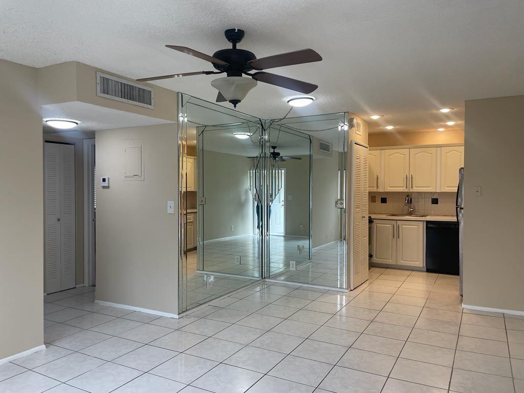 2621 Riverside Drive, Unit 6 Coral Springs, FL 33065 - Photo 4 of 20 a view of a kitchen with a refrigerator and a sink