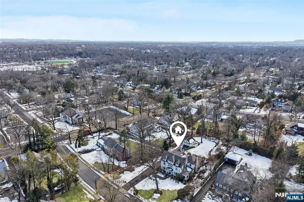 an aerial view of a house with a outdoor space