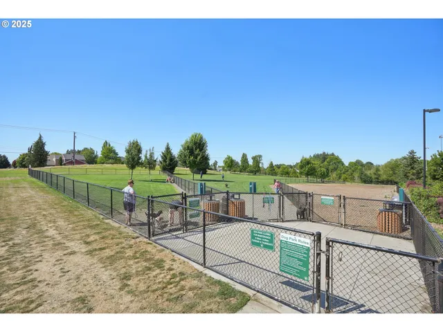 a view of an outdoor space and tennis court