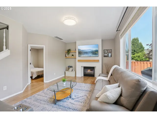 a kitchen with stainless steel appliances a refrigerator sink and cabinets