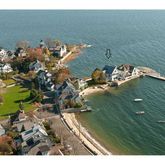 a view of a house with a floor to ceiling window