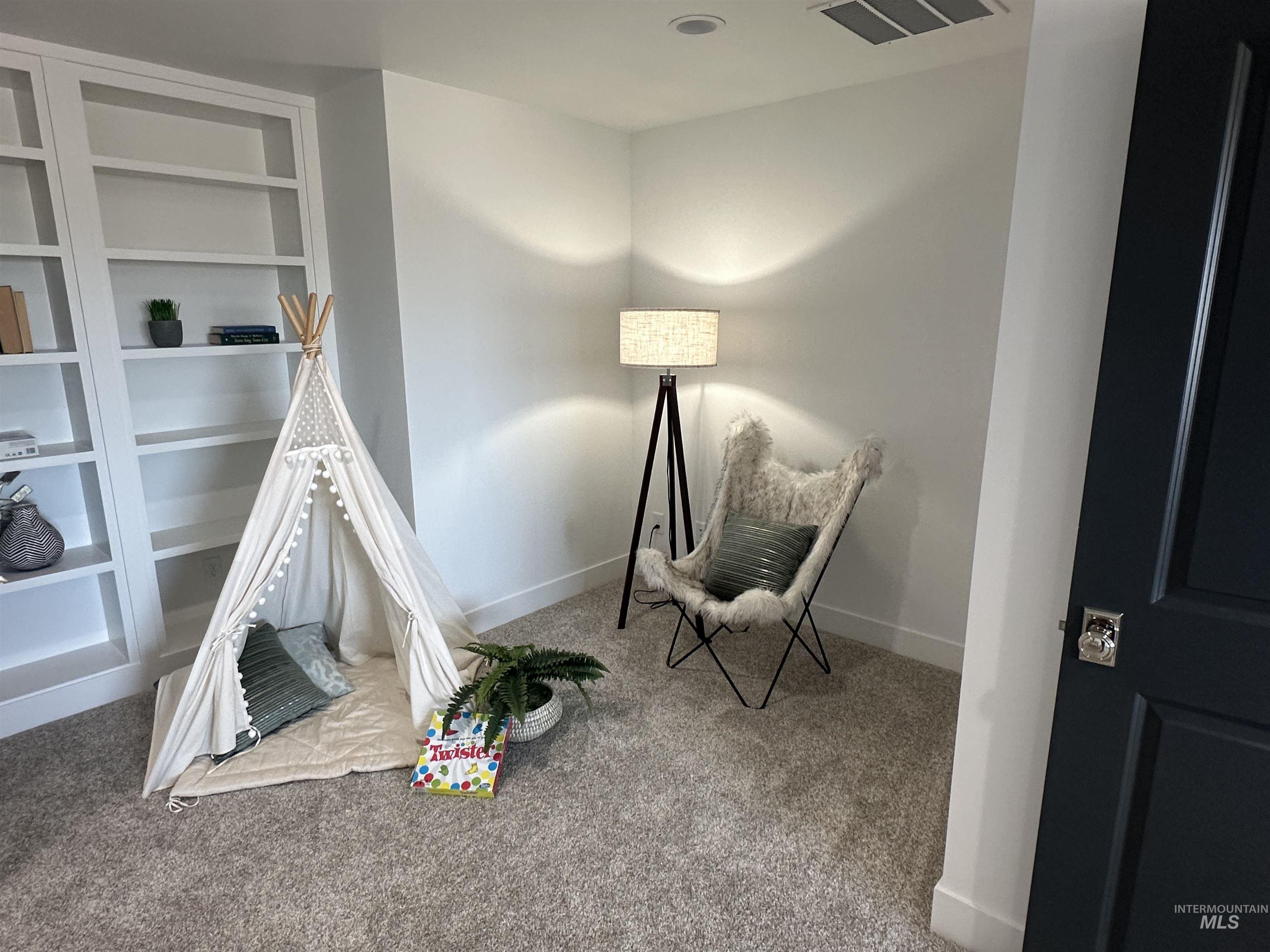 3035 Lake View Twin Falls, ID 83301 - Photo 33 of 41 Built-in white shelving, recessed lighting, and light gray wall-to-wall carpeting