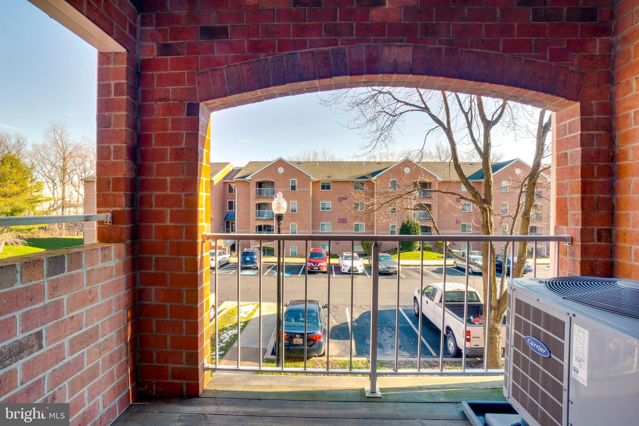 4104 Chardel Road, Unit 1B Baltimore, MD 21236 - Photo 3 of 20 Brick Accent Balcony / Deck