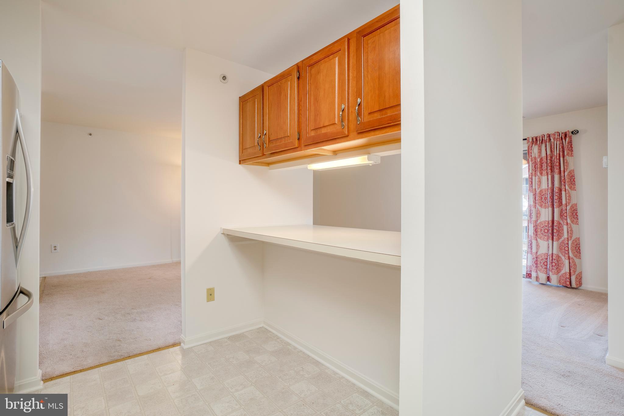 4104 Chardel Road, Unit 1B Baltimore, MD 21236 - Photo 8 of 20 Breakfast Bar With Under Cabinet Lights