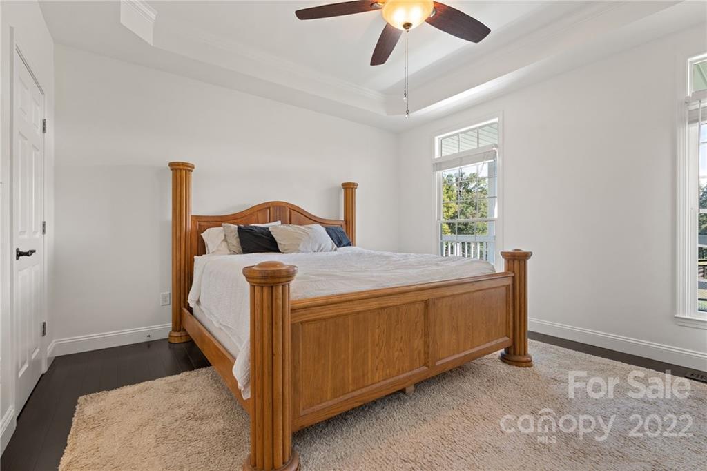 770 Grindstone Road Waynesville, NC 28785 - Photo 21 of 48 a bedroom with bed and window