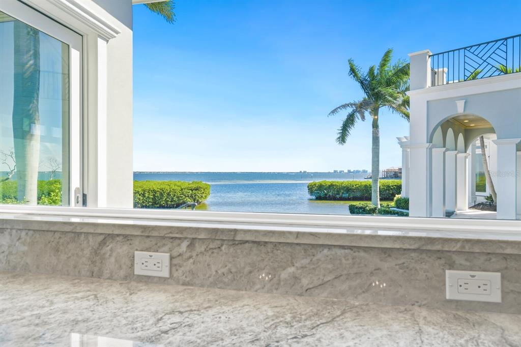 560 Harbor Point Road Longboat Key, FL 34228 - Photo 16 of 64 a view of a house with a outdoor space