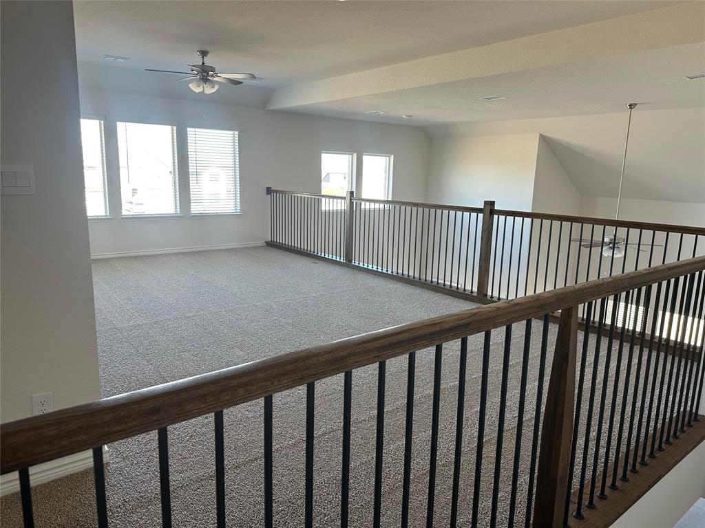 2408 Grapevine Way Celina, TX 75009 - Photo 10 of 20 Corridor with carpet and baseboards