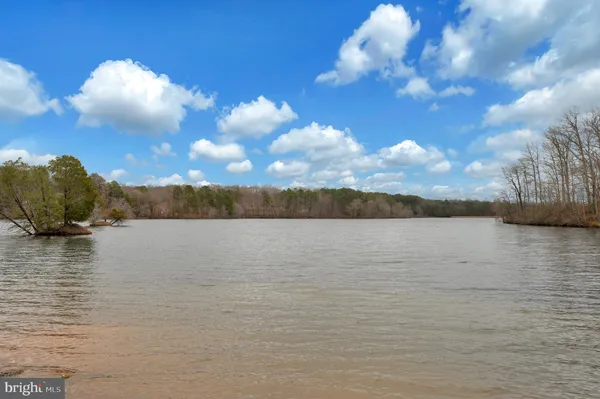 a view of a balcony with chairs