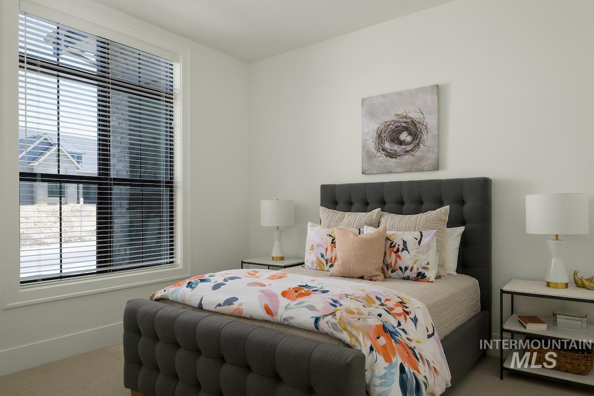 11415 North Misty Ridge Way Boise, ID 83714 - Photo 8 of 46 Carpeted bedroom with multiple windows