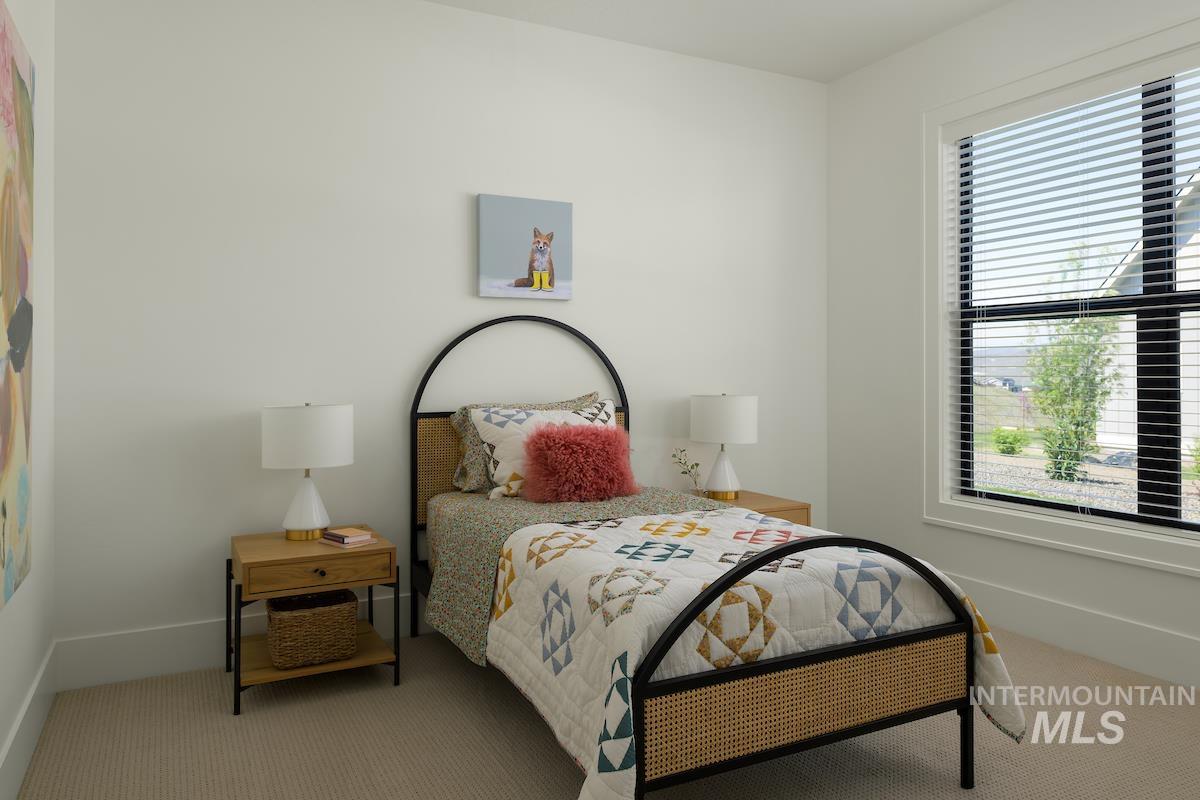11415 North Misty Ridge Way Boise, ID 83714 - Photo 9 of 46 Carpeted bedroom with baseboards