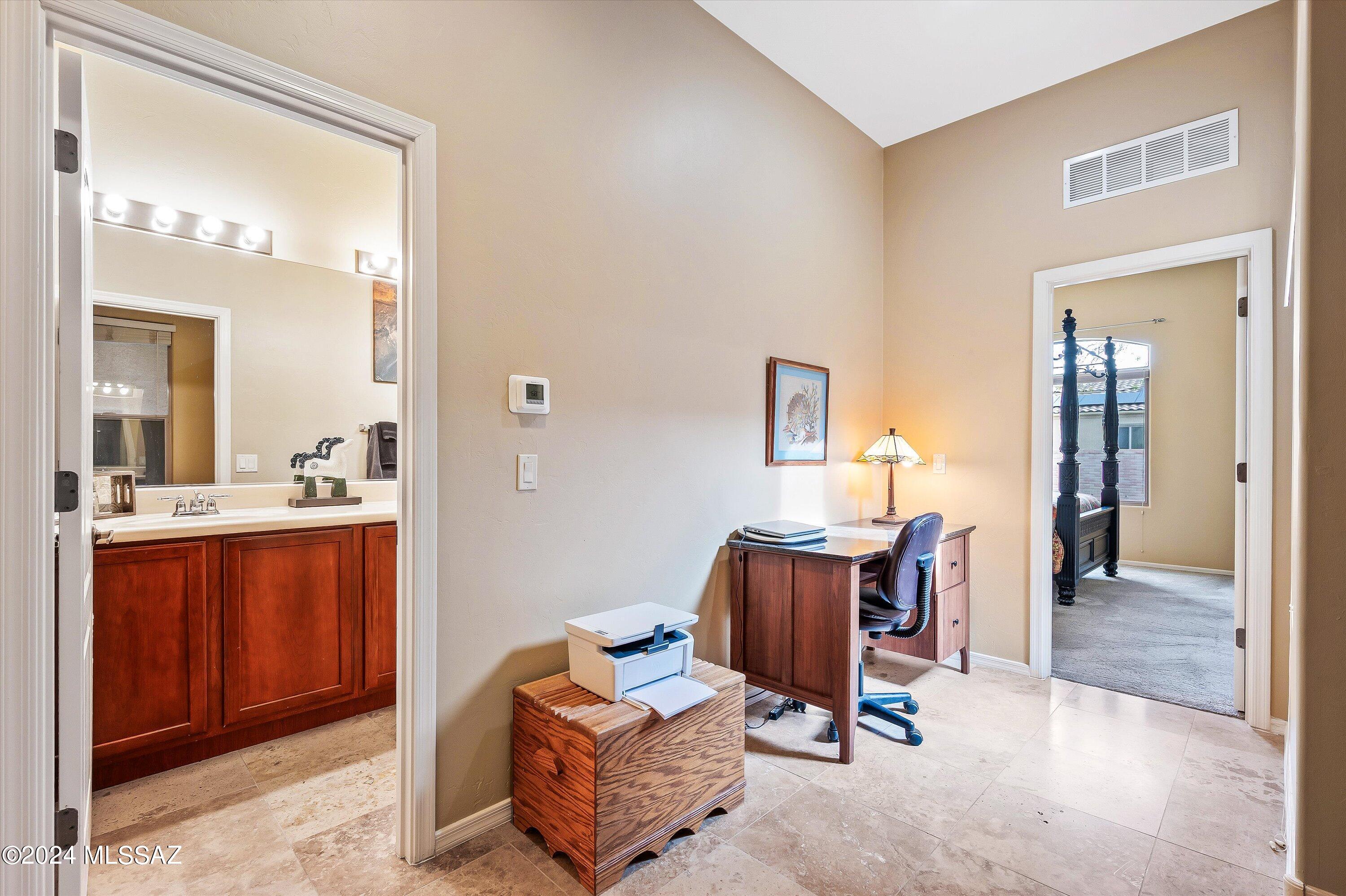 8579 North Shadow Wash Way Tucson, AZ 85743 - Photo 13 of 34 a view of room with furniture and windows