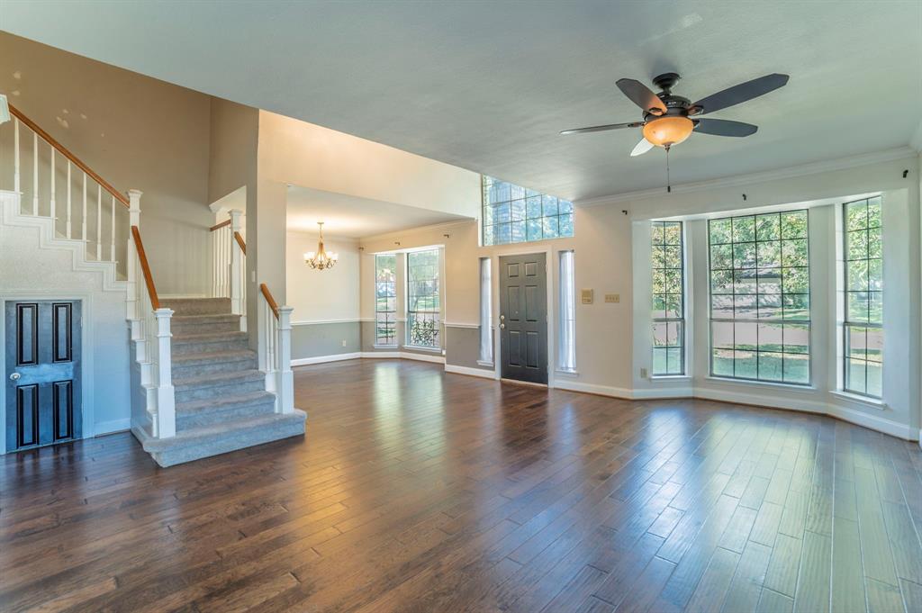 1240 Trinity Drive Benbrook, TX 76126 - Photo 33 of 33 a view of an entryway with wooden floor and a window