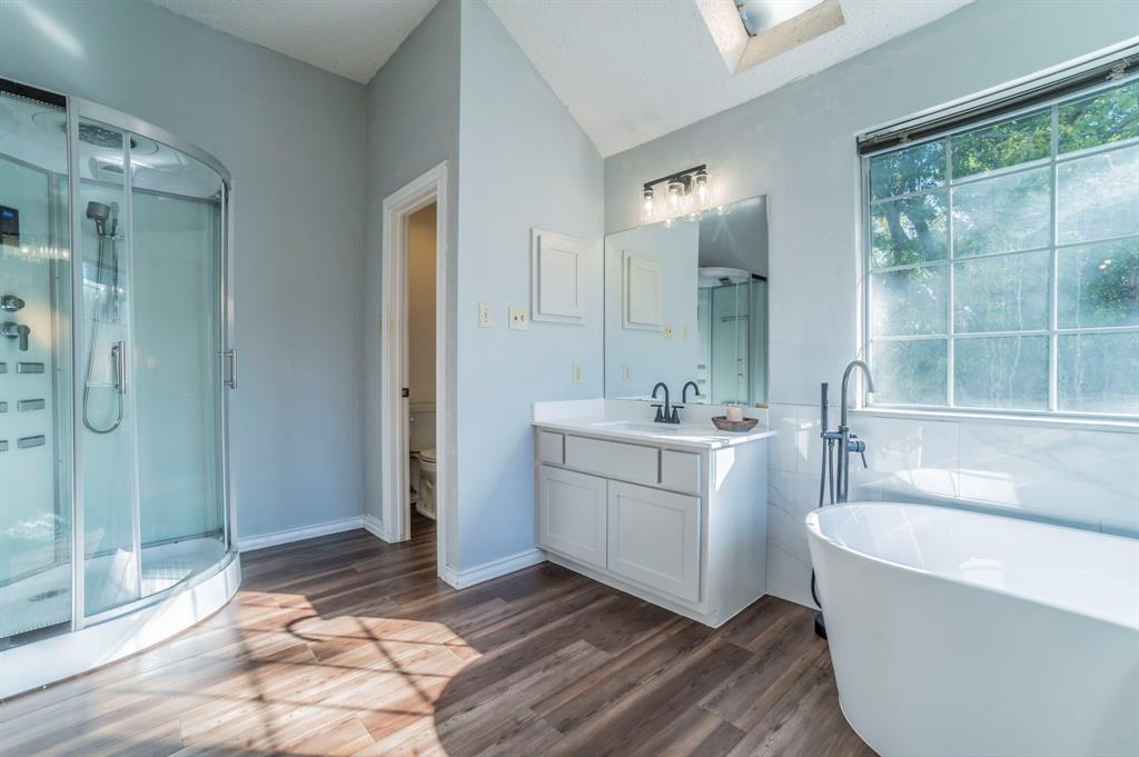 1240 Trinity Drive Benbrook, TX 76126 - Photo 15 of 33 a bathroom with a tub sink and shower