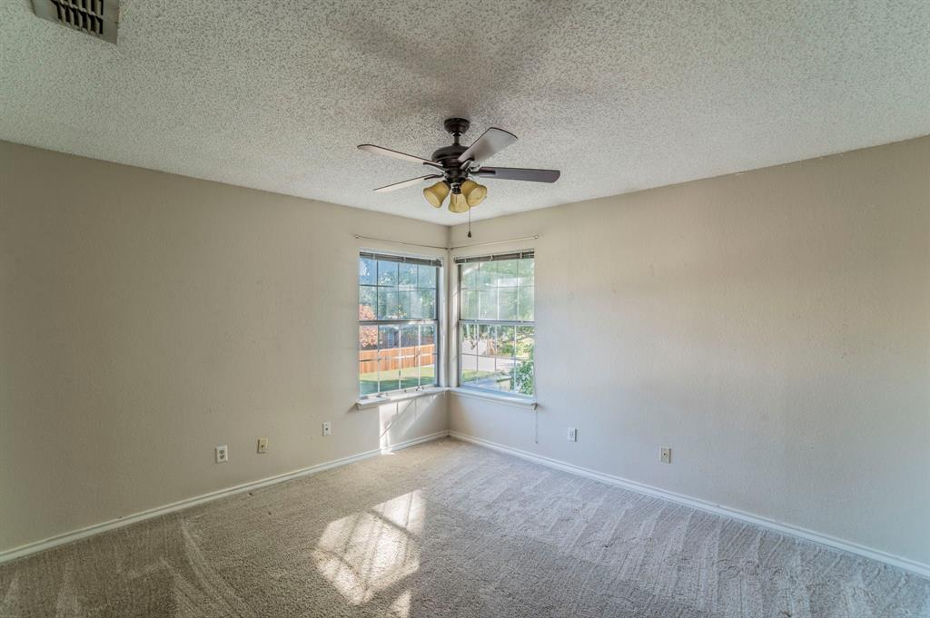 1240 Trinity Drive Benbrook, TX 76126 - Photo 19 of 33 wooden floor in an empty room with a window