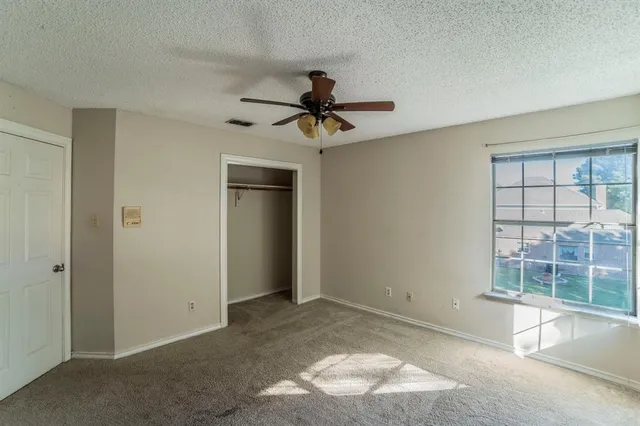 a bathroom with a sink double vanity and a mirror
