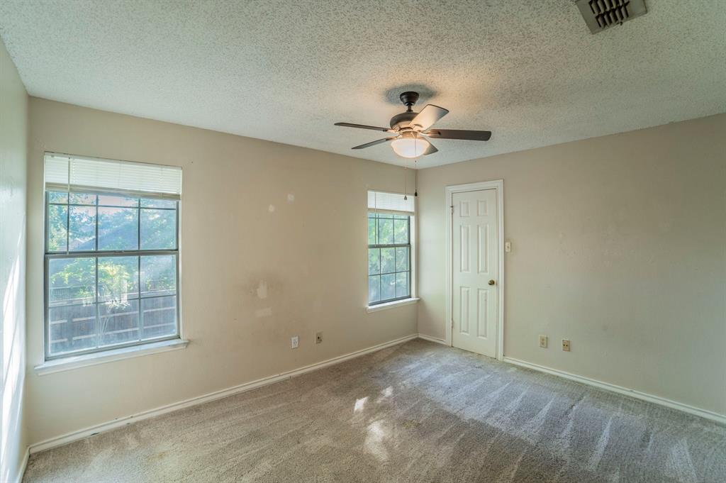 1240 Trinity Drive Benbrook, TX 76126 - Photo 21 of 33 a view of an empty room with a window