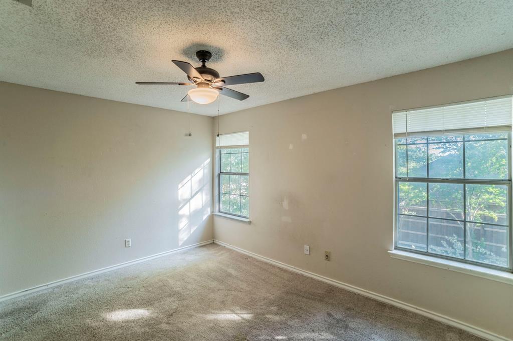 1240 Trinity Drive Benbrook, TX 76126 - Photo 22 of 33 a view of an empty room with a window