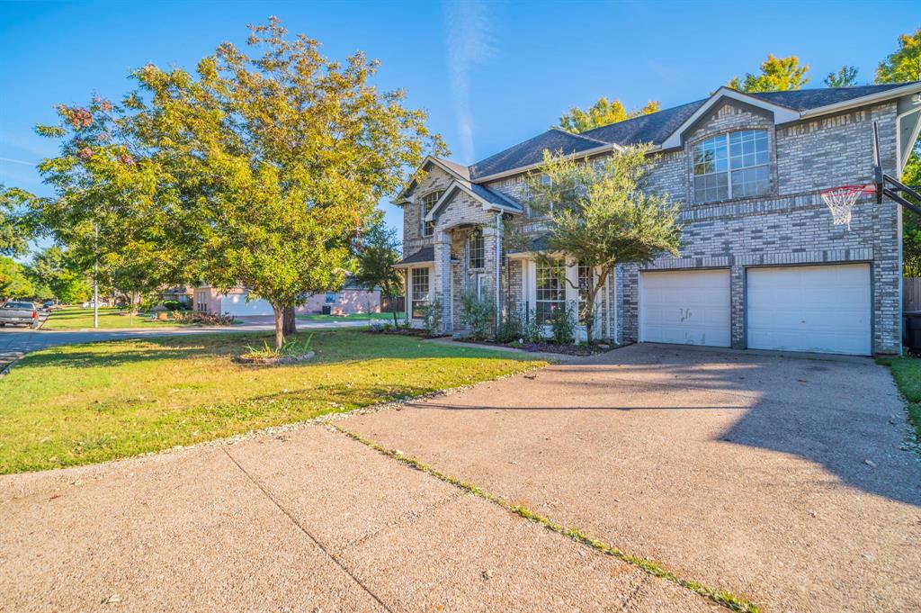 1240 Trinity Drive Benbrook, TX 76126 - Photo 23 of 33 a view of house with a swimming pool