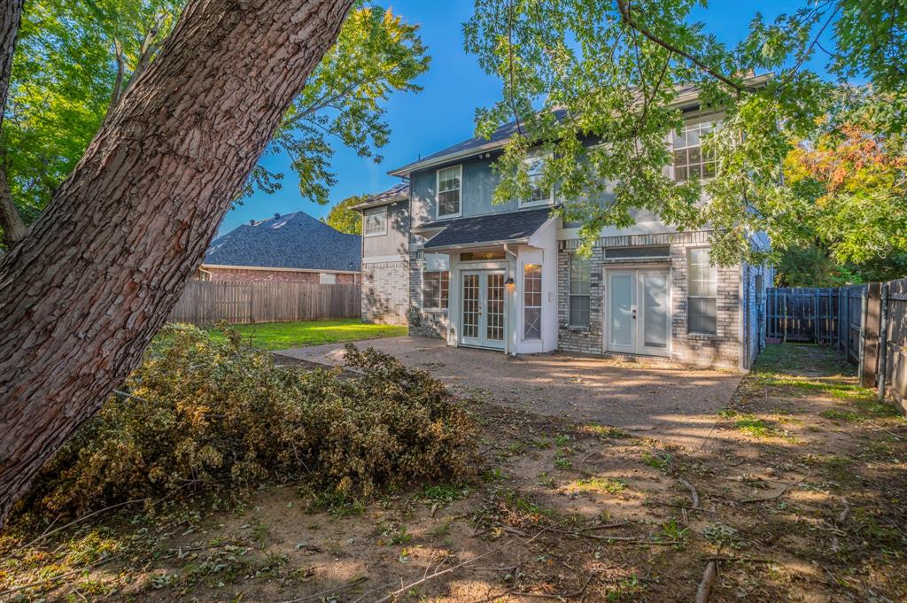 1240 Trinity Drive Benbrook, TX 76126 - Photo 27 of 33 a view of a house with a yard