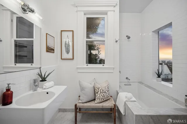 a view of a workspace room with furniture window and outside view