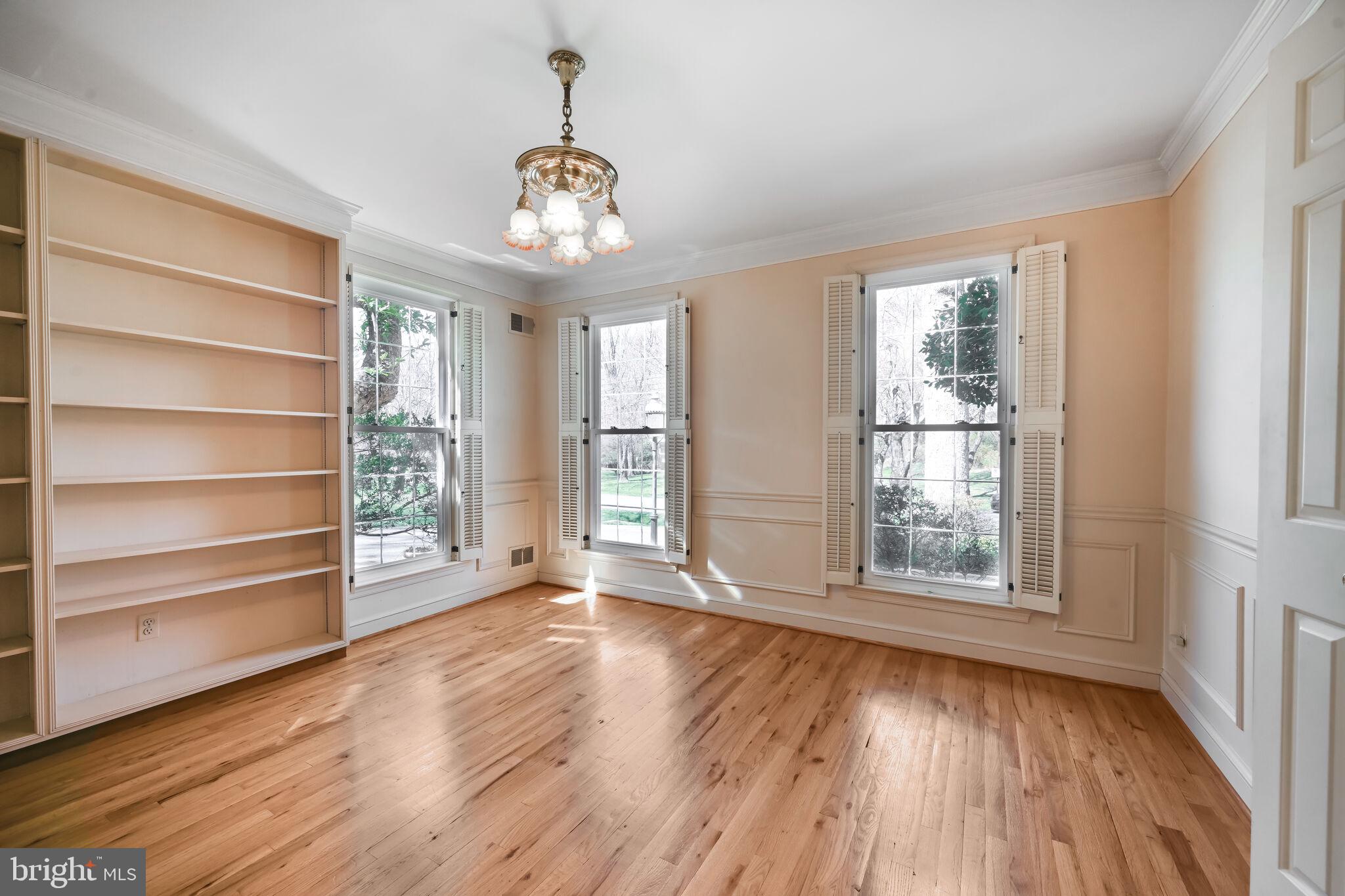 11337 Willowbrook Drive Rockville, MD 20854 - Photo 18 of 50 wooden floor in an empty room with a window