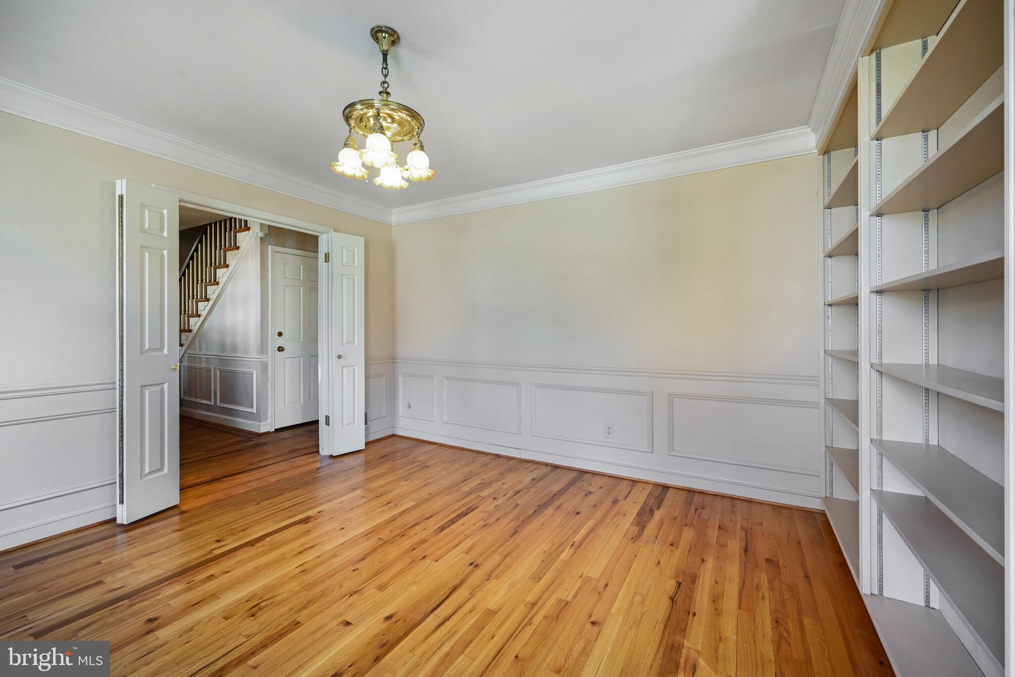 11337 Willowbrook Drive Rockville, MD 20854 - Photo 19 of 50 wooden floor in an empty room with a window